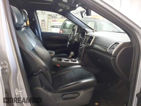 2018 Jeep Grand Cherokee Laredo E with VIN 1C4RJFAG7JC203793, listed as a IAAI auction lot 42585072 with 263,987 mi miles and . Bid and sale history available at DreamBid. Image 5.