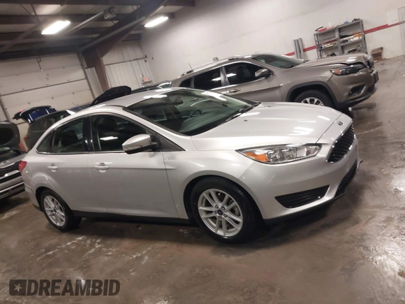 2015 Ford Focus SE with VIN 1FADP3F28FL357382, listed as a IAAI auction lot 41223441 with 47,682 mi miles. Bid and sale history available at carsss.com. Image 13.