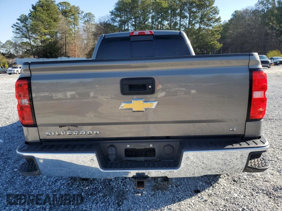 2017 Chevrolet Silverado 1500 LT with VIN 1GCVKREC4HZ222202, listed as a Copart auction lot 48537465 with 106,792 mi miles and Salvage Title. Bid and sale history available at DreamBid. Image 6.