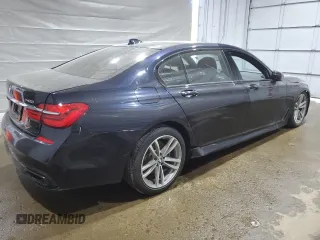2019 BMW 7 Series 740i xDrive with VIN WBA7E4C58KGV70026, listed as a Copart auction lot 59465615 with Not provided miles and Salvage title. Bid and sale history available at DreamBid. Image 3.