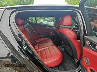 2018 Kia Stinger GT2 with VIN KNAE55LCXJ6016776, listed as a Copart auction lot 55637905 with 57,767 mi miles and Clean Title. Bid and sale history available at carsss.com. Image 6.