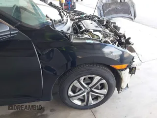 2018 Honda Civic LX with VIN 2HGFC2F53JH605760, listed as a IAAI auction lot 42032200 with 217,239 mi miles and . Bid and sale history available at DreamBid. Image 19.