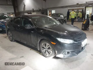 2016 Honda Civic Sedan EX-L with VIN 19XFC1F75GE210803, listed as a IAAI auction lot 41424370 with 111,848 mi miles. Bid and sale history available at carsss.com. Image 1.