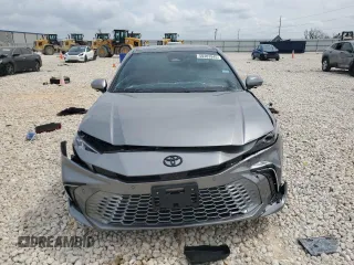 2025 Toyota Camry LE with VIN 4T1DAACKXSU563016, listed as a Copart auction lot 50403945 with 1,689 mi miles and Salvage Title. Bid and sale history available at carsss.com. Image 5.