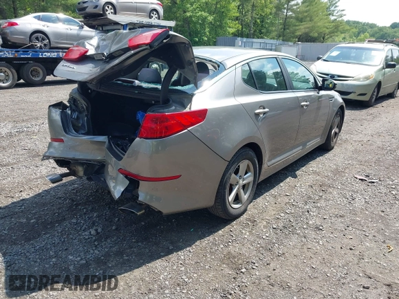 2015 Kia Optima LX z VIN 5XXGM4A73FG375345, wystawiony jako IAAI lot #42373557 z przebiegiem 180 029 mil mil oraz . Historia ofert i sprzedaży dostępna na DreamBid. Obrazek 4.