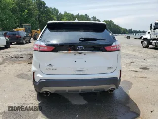 2020 Ford Edge SEL z VIN 2FMPK3J99LBA57125, wystawiony jako Copart lot #59915095 z przebiegiem 101 081 mil mil oraz Szkoda całkowita • Salvage title. Historia ofert i sprzedaży dostępna na DreamBid. Obrazek 6.