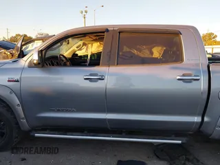 2013 Toyota Tundra Limited z VIN 5TFHY5F10DX277740, wystawiony jako IAAI lot #41085086 z przebiegiem 244 200 mil mil oraz . Historia ofert i sprzedaży dostępna na DreamBid. Obrazek 14.