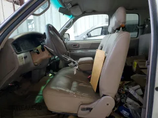 1997 Toyota T100 SR5 with VIN JT4UN24D9V0048079, listed as a Copart auction lot 87042344 with 303,785 mi miles and Salvage Title. Bid and sale history available at DreamBid. Image 7.