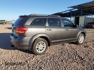 2017 Dodge Journey SXT with VIN 3C4PDCBG0HT589032, listed as a Copart auction lot 62342525 with 121,980 mi miles and Salvage title. Bid and sale history available at DreamBid. Image 3.