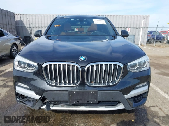 2019 BMW X3 xDrive30i with VIN 5UXTR9C52KLR11316, listed as a IAAI auction lot 42002750 with 58,127 mi miles and . Bid and sale history available at DreamBid. Image 12.