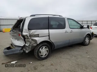 2001 Toyota Sienna LE with VIN 4T3ZF13C71U399066, listed as a Copart auction lot 85601134 with 81,233 mi miles and Salvage Title. Bid and sale history available at carsss.com. Image 3.