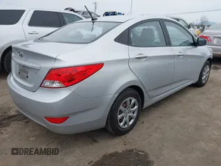 2013 Hyundai Accent GLS z VIN KMHCT4AE3DU548980, wystawiony jako IAAI lot #41562618 z przebiegiem 62 704 mil mil oraz . Historia ofert i sprzedaży dostępna na DreamBid. Obrazek 4.