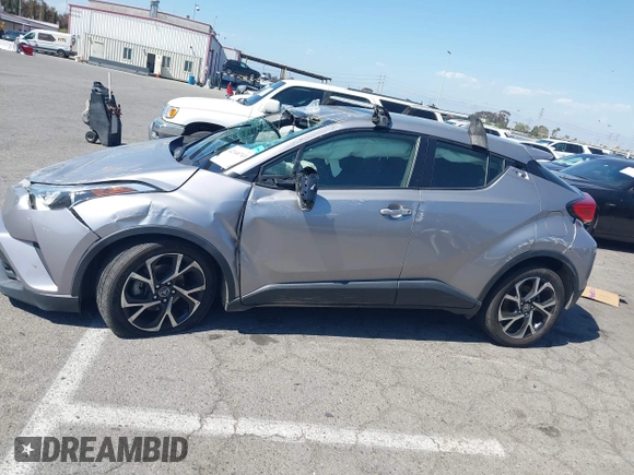 2019 Toyota C-HR XLE with VIN JTNKHMBX8K1046347, listed as a IAAI auction lot 42140743 with 49,918 mi miles and . Bid and sale history available at DreamBid. Image 13.