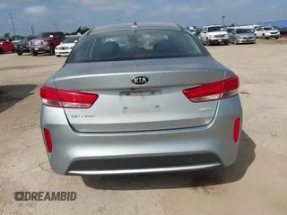 2017 Kia Optima with VIN KNAGT4LE6H5009057, listed as a IAAI auction lot 42521270 with 129,853 mi miles and . Bid and sale history available at DreamBid. Image 16.