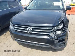 2020 Volkswagen Tiguan S with VIN 3VV1B7AX1LM086019, listed as a IAAI auction lot 42458434 with 114,413 mi miles and . Bid and sale history available at DreamBid. Image 18.