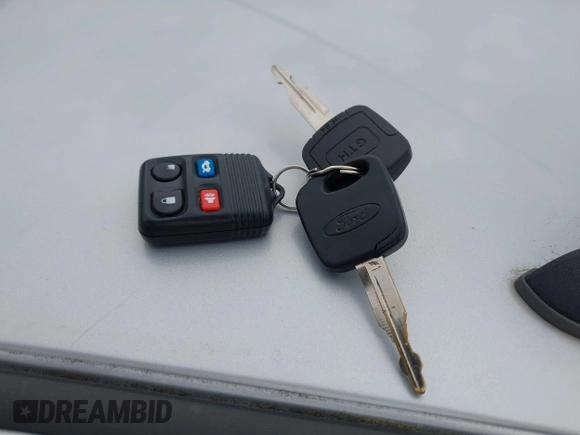 2003 Ford Focus SE Fleet z VIN 1FAFP36323W191551, wystawiony jako IAAI lot #42498013 z przebiegiem 142 724 mil mil oraz . Historia ofert i sprzedaży dostępna na DreamBid. Obrazek 11.