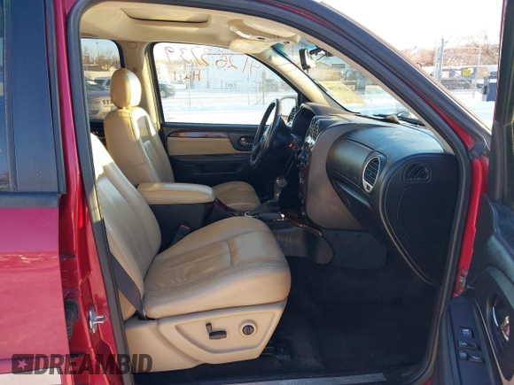 2005 GMC Envoy SLE with VIN 1GKET16S056147701, listed as a IAAI auction lot 41263739 with 179,455 mi miles. Bid and sale history available at carsss.com. Image 5.