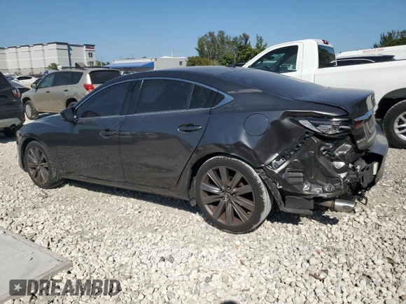 2018 Mazda 6 Grand Touring with VIN JM1GL1TY6J1303258, listed as a Copart auction lot 48738325 with 64,169 mi miles and Salvage Title. Bid and sale history available at DreamBid. Image 2.