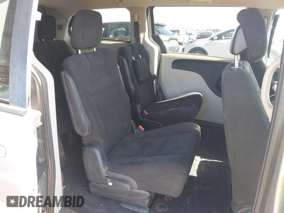 2015 Dodge Grand Caravan SXT with VIN 2C4RDGCG1FR649074, listed as a IAAI auction lot 41759409 with 116,856 mi miles and . Bid and sale history available at DreamBid. Image 8.
