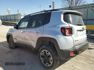 2015 Jeep Renegade Trailhawk with VIN ZACCJBCT8FPB28355, listed as a Copart auction lot 48738275 with 64,423 mi miles and Salvage title. Bid and sale history available at DreamBid. Image 2.