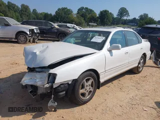 1998 Toyota Avalon XL with VIN 4T1BF18B8WU263045, listed as a IAAI auction lot 40216979 with 150,592 mi miles and . Bid and sale history available at DreamBid. Image 2.