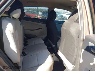 2016 Hyundai Tucson Sport with VIN KM8J33A20GU183234, listed as a IAAI auction lot 41429777 with 113,077 mi miles. Bid and sale history available at carsss.com. Image 8.