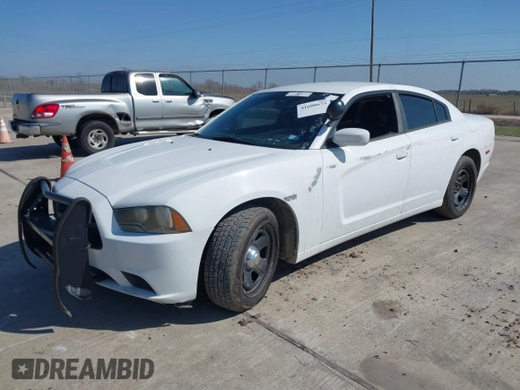 2012 Dodge Charger Police with VIN 2C3CDXAT6CH305817, listed as a IAAI auction lot 41608673 with 173,761 mi miles. Bid and sale history available at carsss.com. Image 2.