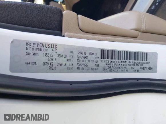 2019 Jeep Grand Cherokee Laredo E with VIN 1C4RJFAG7KC694674, listed as a IAAI auction lot 41591678 with 61,144 mi miles. Bid and sale history available at carsss.com. Image 9.