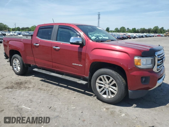 2017 GMC Canyon 4WD SLT with VIN 1GTP6DE14H1302564, listed as a Copart auction lot 54965815 with 214,501 mi miles and Clean Title. Bid and sale history available at carsss.com. Image 4.