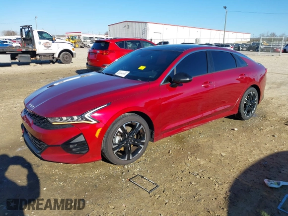 2022 Kia K5 GT-Line z VIN 5XXG64J26NG107886, wystawiony jako IAAI lot #41054102 z przebiegiem 88 516 mil mil oraz . Historia ofert i sprzedaży dostępna na DreamBid. Obrazek 2.
