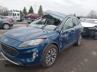 2020 Ford Escape Titanium with VIN 1FMCU9J98LUC00068, listed as a IAAI auction lot 41843755 with 42,525 mi miles and . Bid and sale history available at DreamBid. Image 6.
