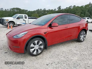 2023 Tesla Model Y Long Range z VIN 7SAYGDEE0PA091597, wystawiony jako Copart lot #56962545 z przebiegiem 18 703 mil mil oraz Szkoda całkowita • Salvage title. Historia ofert i sprzedaży dostępna na DreamBid. Obrazek 1.