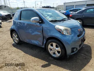2012 Scion iQ z VIN JTNJJXB07CJ018481, wystawiony jako Copart lot #54014265 z przebiegiem 54 331 mil mil oraz Szkoda całkowita • Salvage title. Historia ofert i sprzedaży dostępna na DreamBid. Obrazek 4.