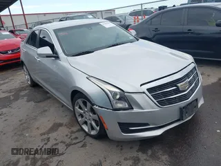 2015 Cadillac ATS Luxury RWD z VIN 1G6AB5RA2F0105576, wystawiony jako IAAI lot #41962665 z przebiegiem 160 050 mil mil oraz . Historia ofert i sprzedaży dostępna na DreamBid. Obrazek 1.