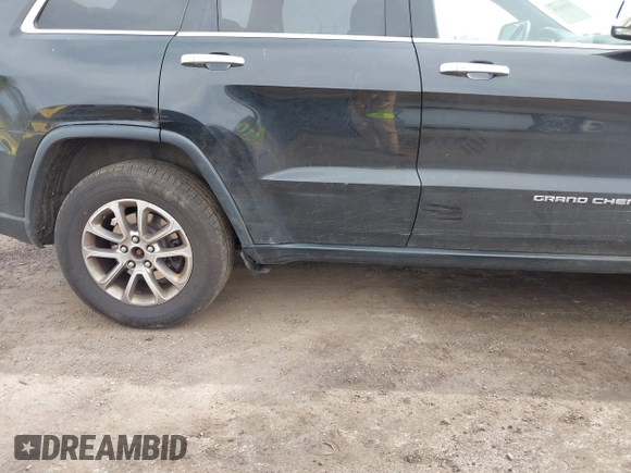 2014 Jeep Grand Cherokee Limited with VIN 1C4RJFBG4EC220054, listed as a IAAI auction lot 42050036 with 100,552 mi miles and . Bid and sale history available at DreamBid. Image 18.