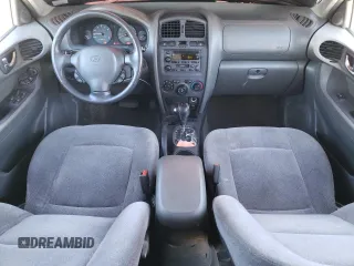 2003 Hyundai Santa Fe GLS with VIN KM8SC73D43U473982, listed as a Copart auction lot 82681954 with 252,240 mi miles and Salvage Title. Bid and sale history available at carsss.com. Image 8.