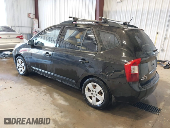 2009 Kia Rondo LX with VIN KNAFG528297278647, listed as a IAAI auction lot 42139810 with 161,314 mi miles. Bid and sale history available at carsss.com. Image 3.