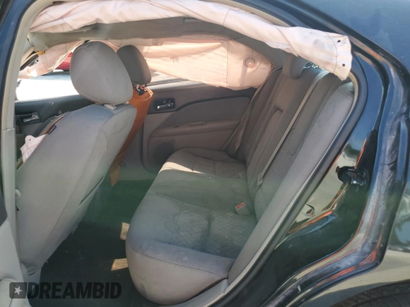 2012 Ford Fusion SE with VIN 3FAHP0HA3CR167698, listed as a Copart auction lot 55909695 with 128,025 mi miles and Salvage title. Bid and sale history available at DreamBid. Image 10.