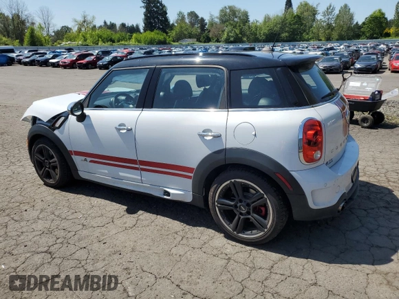 2015 MINI Countryman John Cooper Works with VIN WMWXD1C58FWS34860, listed as a Copart auction lot 55384065 with 48,709 mi miles and Salvage Title. Bid and sale history available at DreamBid. Image 2.