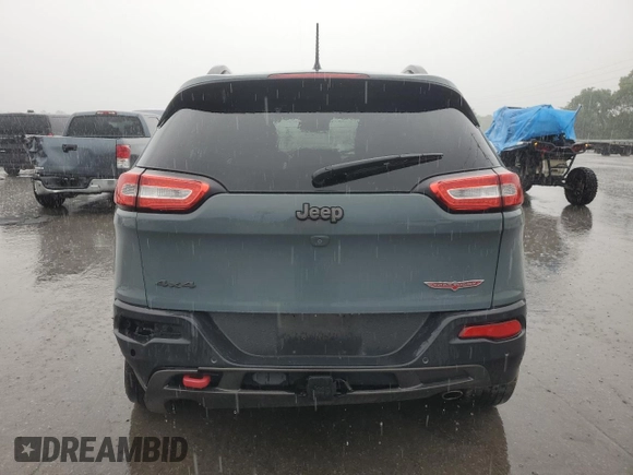 2014 Jeep Cherokee Trailhawk z VIN 1C4PJMBS7EW236960, wystawiony jako Copart lot #57098695 z przebiegiem 159 065 mil mil oraz Czysty tytuł • Clean title. Historia ofert i sprzedaży dostępna na DreamBid. Obrazek 6.