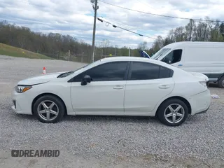 2019 Subaru Impreza with VIN 4S3GKAA6XK3607624, listed as a IAAI auction lot 42005570 with 136,026 mi miles and . Bid and sale history available at DreamBid. Image 14.
