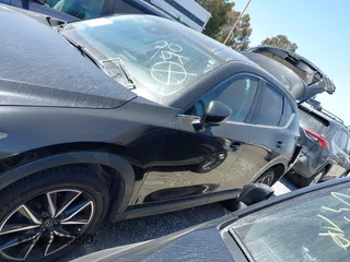 2018 Mazda CX-5 Grand Touring with VIN JM3KFADM4J0326760, listed as a IAAI auction lot 41885100 with 82,091 mi miles and . Bid and sale history available at DreamBid. Image 14.