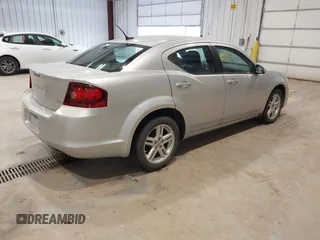 2012 Dodge Avenger SXT with VIN 1C3CDZCB5CN219812, listed as a IAAI auction lot 41928110 with 200,557 mi miles and . Bid and sale history available at carsss.com. Image 4.