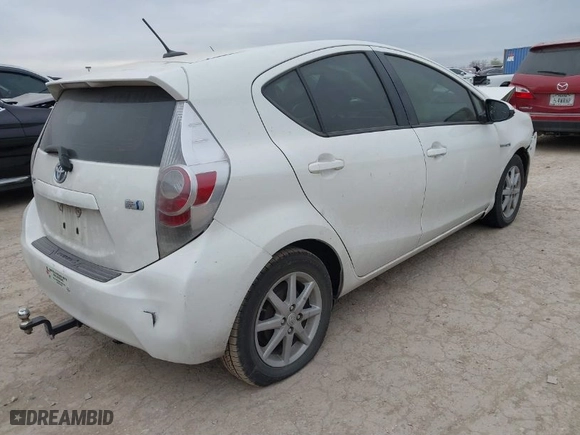2014 Toyota Prius c One with VIN JTDKDTB31E1559712, listed as a IAAI auction lot 41286514 with 173,321 mi miles. Bid and sale history available at carsss.com. Image 4.