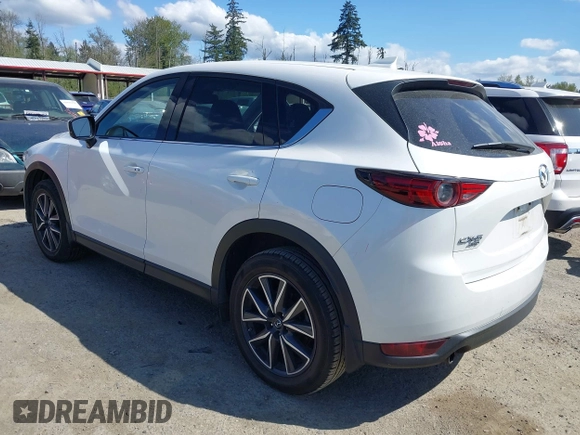 2017 Mazda CX-5 Grand Touring with VIN JM3KFBDL9H0163031, listed as a IAAI auction lot 42098819 with 81,781 mi miles. Bid and sale history available at carsss.com. Image 3.