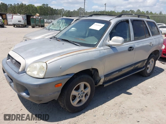 2004 Hyundai Santa Fe GLS with VIN KM8SC13DX4U592070, listed as a IAAI auction lot 42030363 with 296,823 mi miles. Bid and sale history available at carsss.com. Image 2.