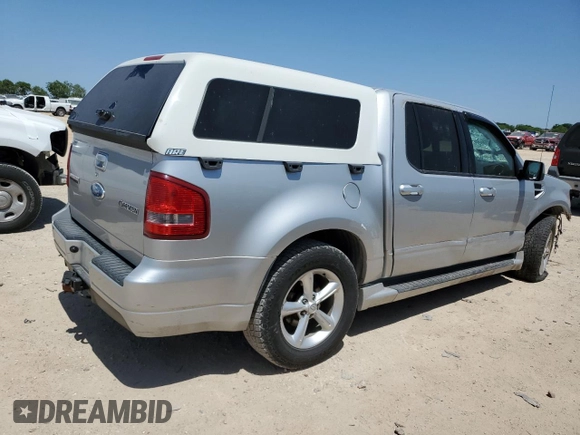 2009 Ford Explorer Sport Trac with VIN 1FMEU23809UA12870, listed as a Copart auction lot 52614055 with 313,938 mi miles and Salvage title. Bid and sale history available at DreamBid. Image 3.
