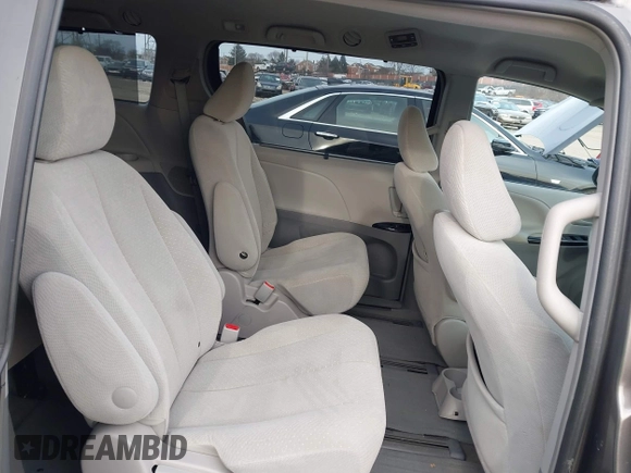 2014 Toyota Sienna LE with VIN 5TDJK3DC1ES087626, listed as a IAAI auction lot 41610813 with 142,311 mi miles and . Bid and sale history available at DreamBid. Image 8.