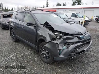 2018 Toyota RAV4 Hybrid SE with VIN JTMJJREV7JD208249, listed as a IAAI auction lot 41859301 with 91,899 mi miles and . Bid and sale history available at DreamBid. Image 1.