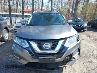2017 Nissan Rogue S with VIN KNMAT2MT1HP611184, listed as a IAAI auction lot 41632876 with 142,488 mi miles. Bid and sale history available at carsss.com. Image 12.